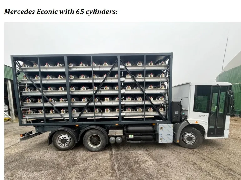 Completed Mercedes-Benz Econic dual-fuel installation with a bank of gas cylinders mounted behind the cab